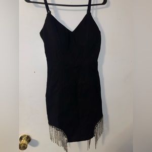 Black fitted dress with rhinestone tassels